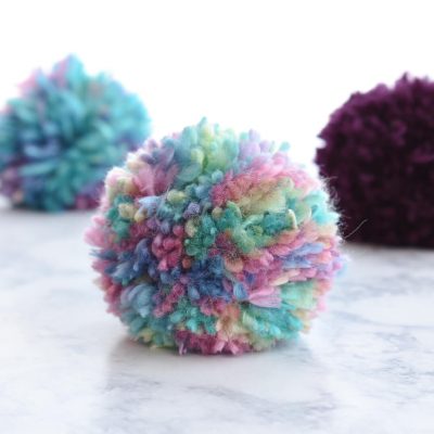 How to make a yarn pom pom with Cricut