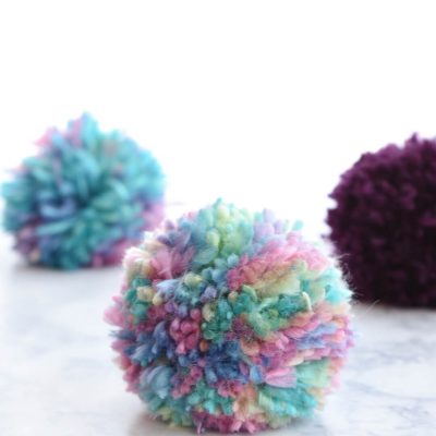 How to make a yarn pom pom with Cricut